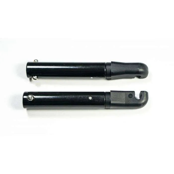 Black folding walking cane on white background.