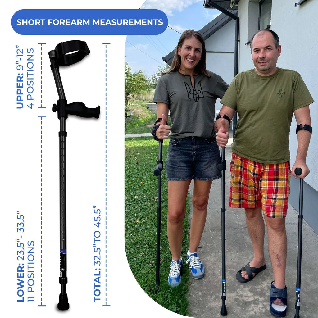 Two people with adjustable crutches, outdoor background.