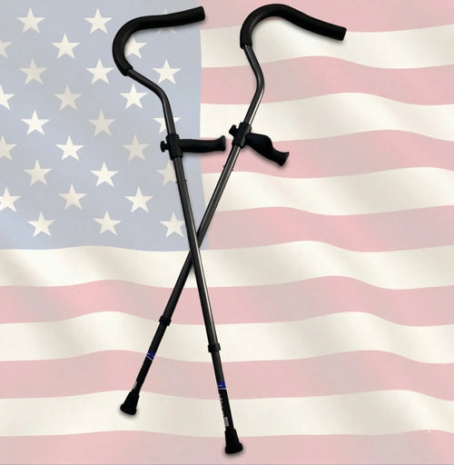 Crossed walking canes over American flag background