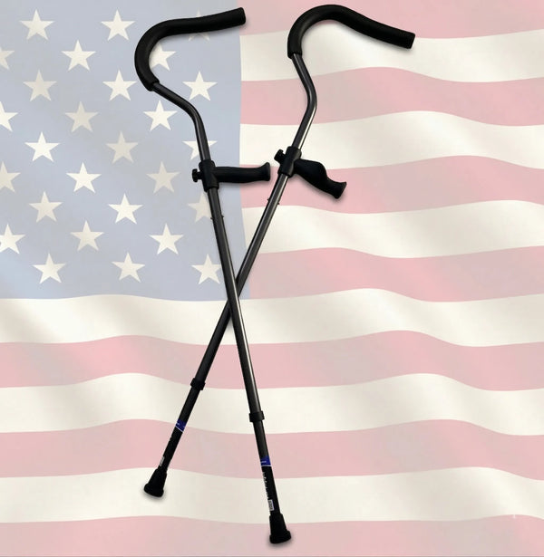 Crossed walking canes over American flag background